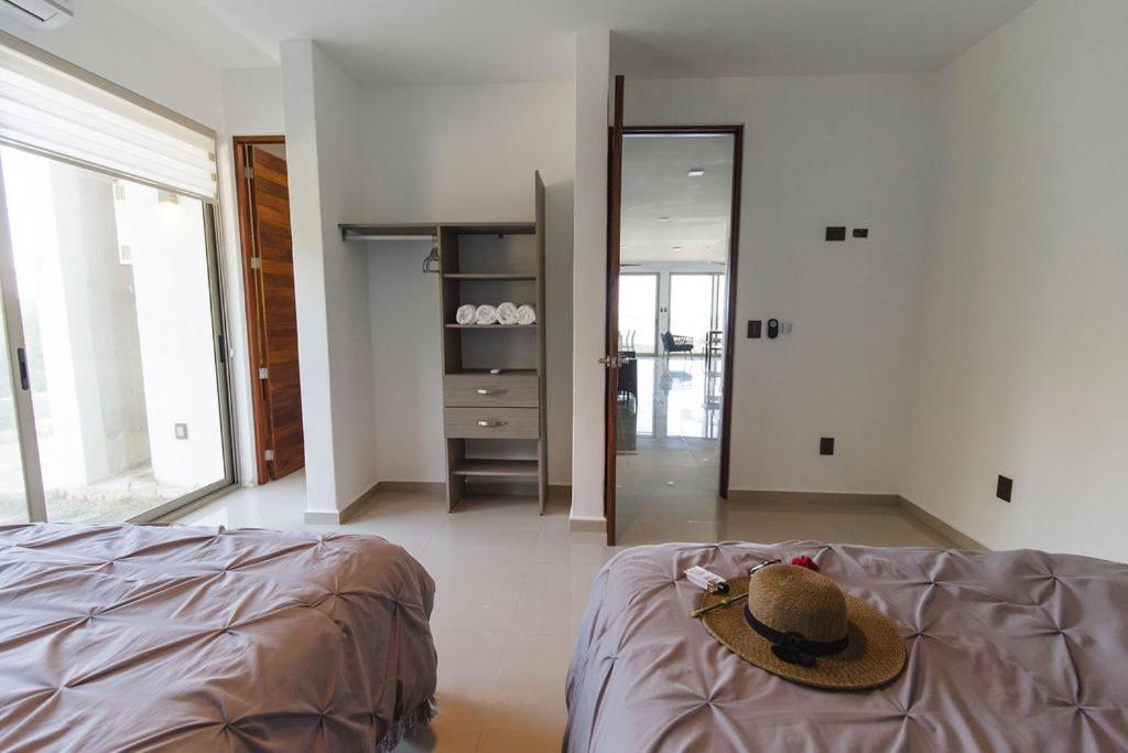 Angelina 28 Beachfront And Family Apartments - Modern And Relaxing Long Stays - 20 Min From Cancun Airport 푸에르토 모렐로스 외부 사진